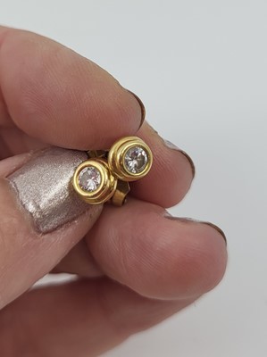 Lot 229 - A PAIR OF DIAMOND STUD EARRINGS, the brilliant...