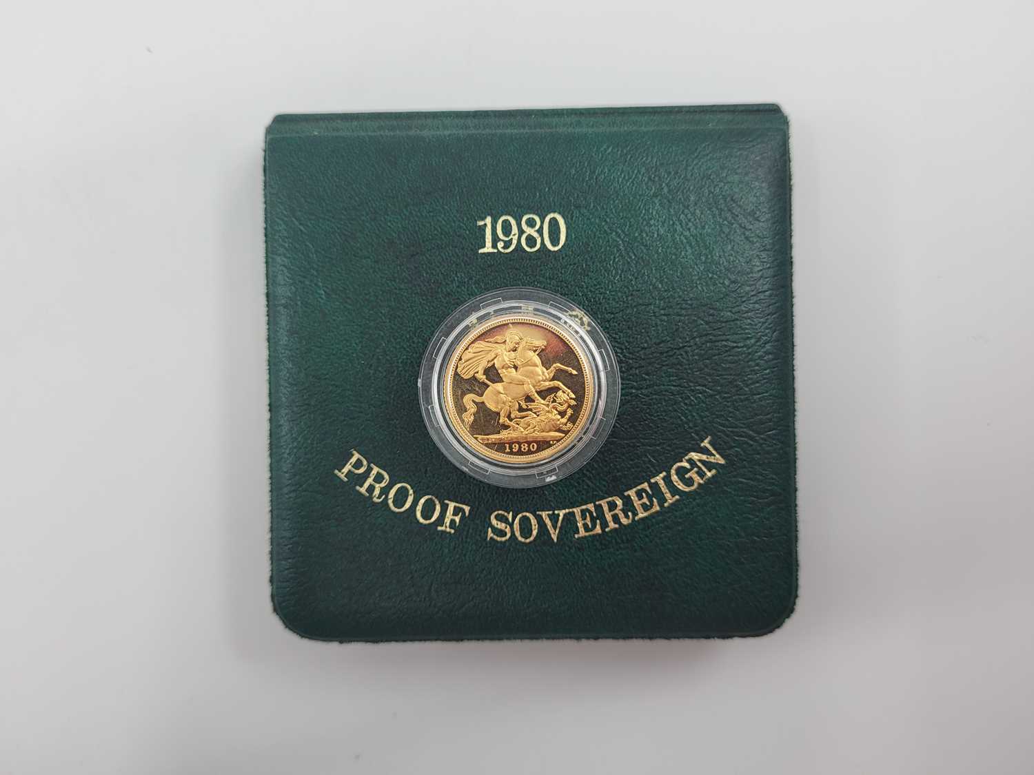Lot 447 - A QUEEN ELIZABETH II PROOF SOVEREIGN GOLD COIN,...