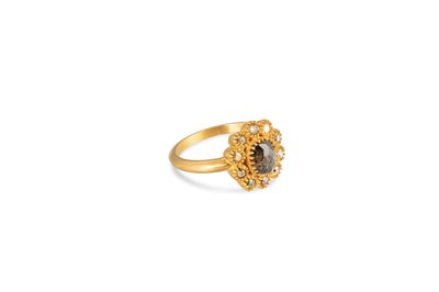 Lot 131 - A DIAMOND CLUSTER RING, the opaque rose cut...