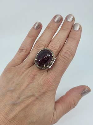 Lot 137 - A LARGE TOURMALINE AND DIAMOND CLUSTER RING,...