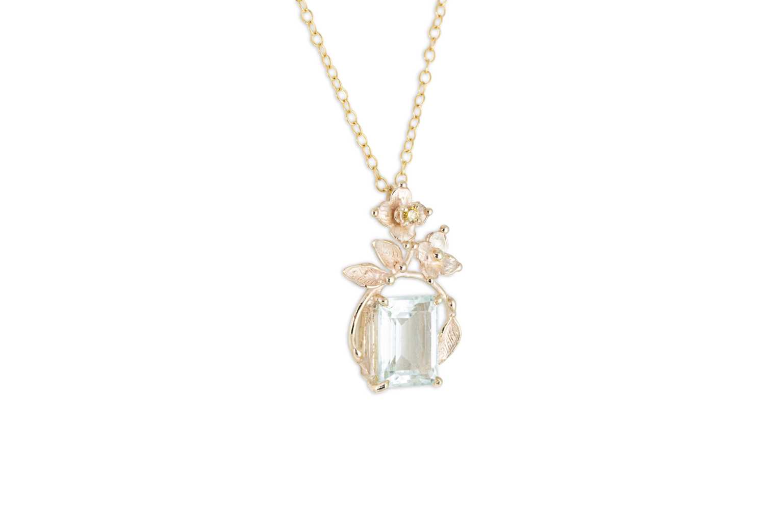 Lot 235 - AN AQUAMARINE AND DIAMOND PENDANT, of...