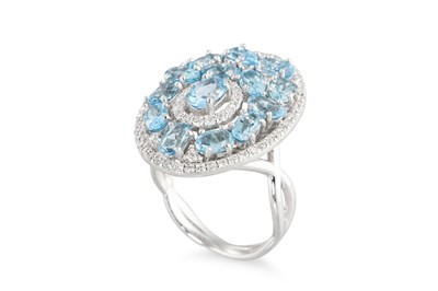 Lot 266 - A TOPAZ AND DIAMOND CLUSTER RING, set in 18ct...