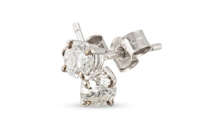 Lot 105 - A PAIR OF DIAMOND STUD EARRINGS, the round...