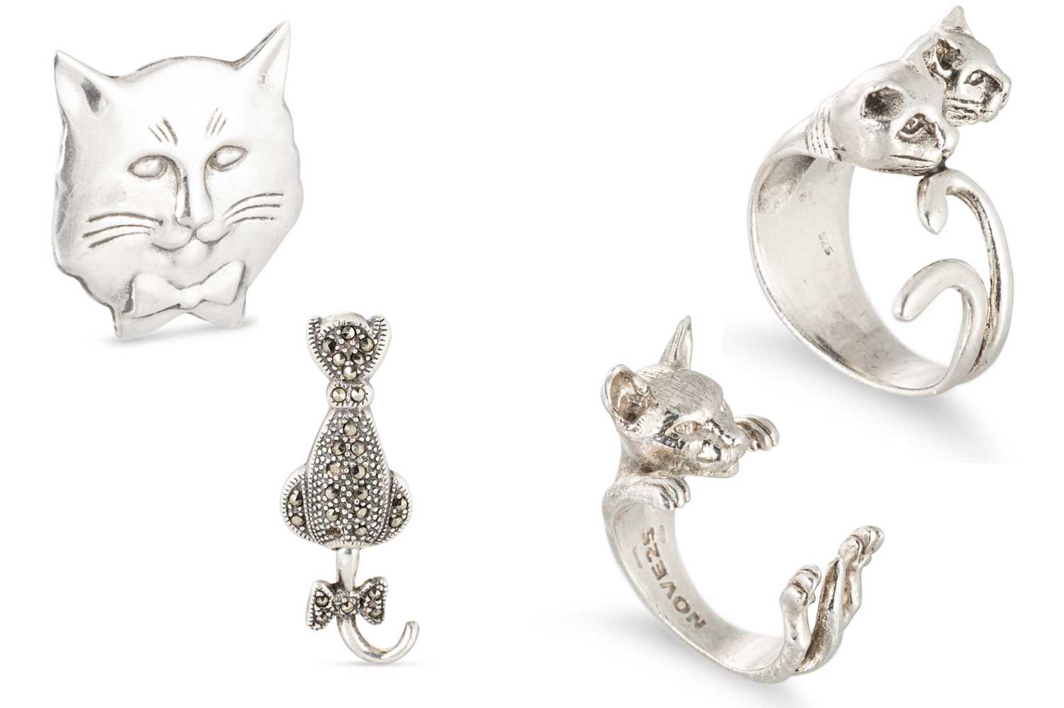 Lot 109 - A MARCASITE BROOCH, modelled as a cat together...