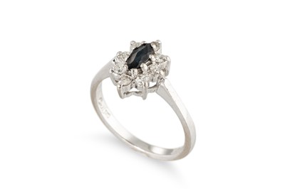 Lot 112 - A DIAMOND AND SAPPHIRE CLUSTER RING, the...
