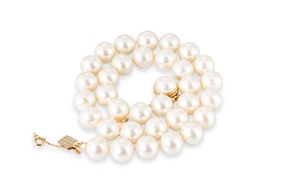 Lot 270 - A STRING OF 'MAJORICA' PEARLS, gilt over a...