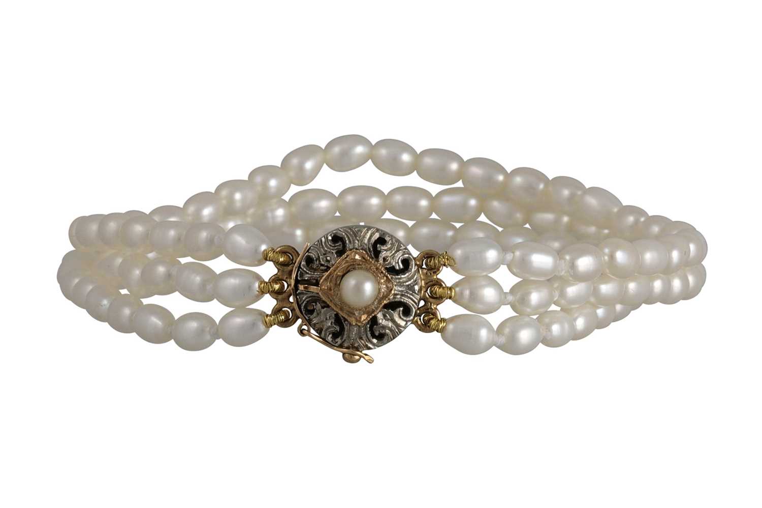 Lot 222 - A PEARL AND DIAMOND BRACELET, the three strand...