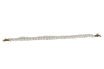 Lot 222 - A PEARL AND DIAMOND BRACELET, the three strand...