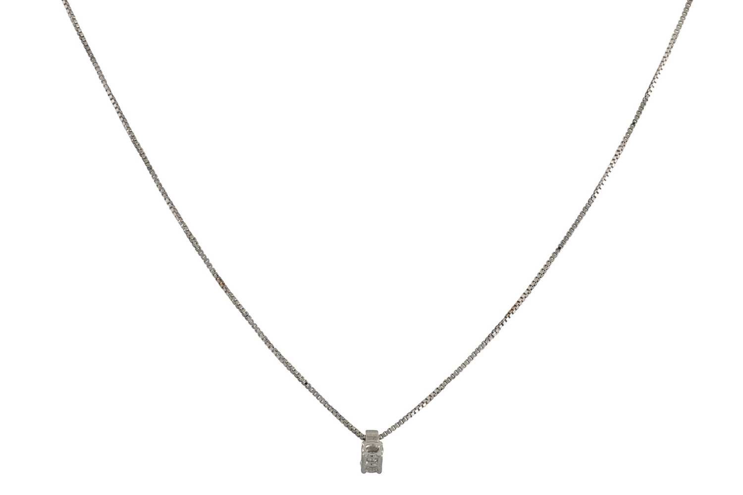 Lot 225 - A DIAMOND SET PENDANT, on a 18ct white gold...