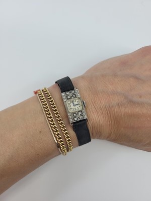 Lot 194 - AN ART DECO DIAMOND AND ENAMEL COCKTAIL WATCH,...