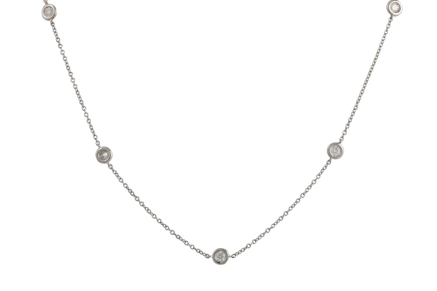 Lot 233 - A DIAMOND SET CHAIN, the brilliant cut collet...