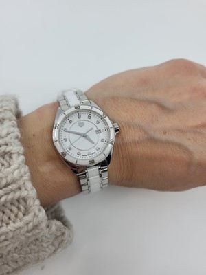 Lot 227 - A LADY'S TAG HEUER WRISTWATCH, stainless steel,...