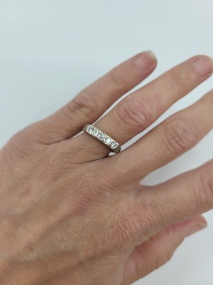 Lot 59 - A FIVE STONE DIAMOND RING, mounted in 14ct...