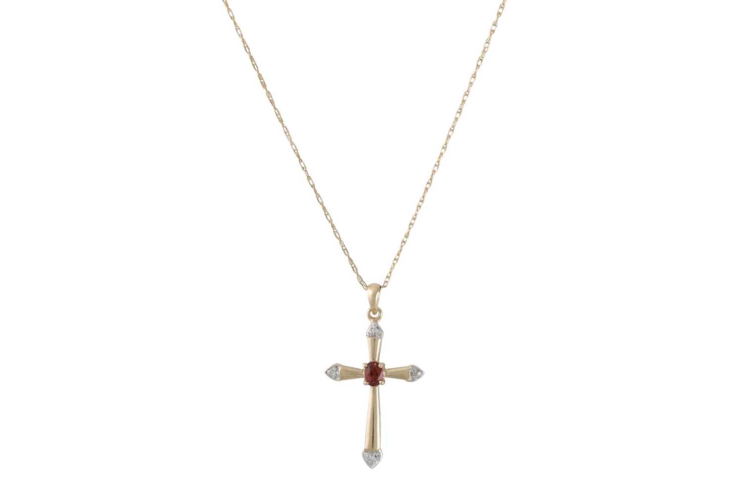 Lot 6 - A DIAMOND AND GARNET CROSS, on a 9ct yellow...