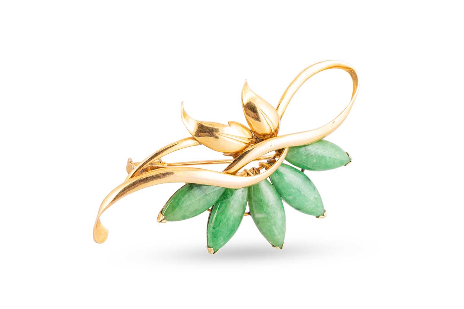Lot 88 - A JADE SET BROOCH, of naturalistic form,...