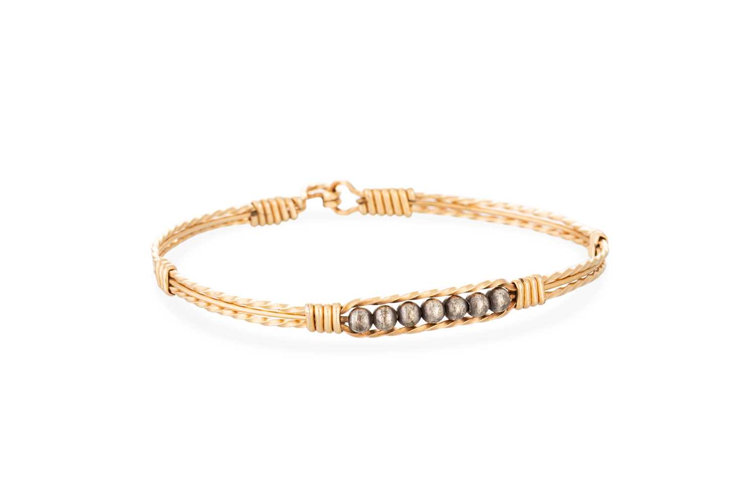 Lot 37 - A YELLOW GOLD BANGLE, 3 g., unmarked XRF...