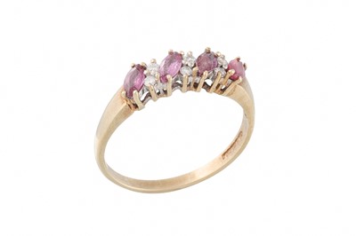 Lot 12 - A DIAMOND AND RUBY RING, set with four rubies,...