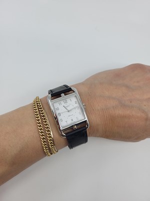 Lot 234 - A LADY'S STAINLESS STEEL HERMÈS 'CAPE COD-AUTO...