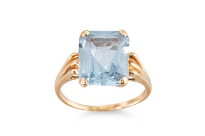 Lot 230 - A TOPAZ SET DRESS RING, mounted in 14ct yellow...
