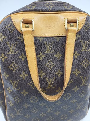 Lot 244 - A LOUIS VUITTON MONOGRAM 'EXCURSION' HANDBAG,...
