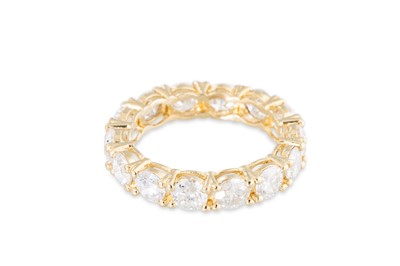 Lot 94 - A DIAMOND SET FULL ETERNITY RING, the round...