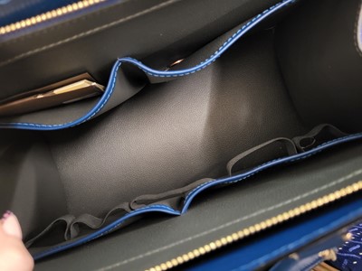 Lot 235 - A LOUIS VUITTON 'RIVIERA' LADY'S HANDBAG, blue,...