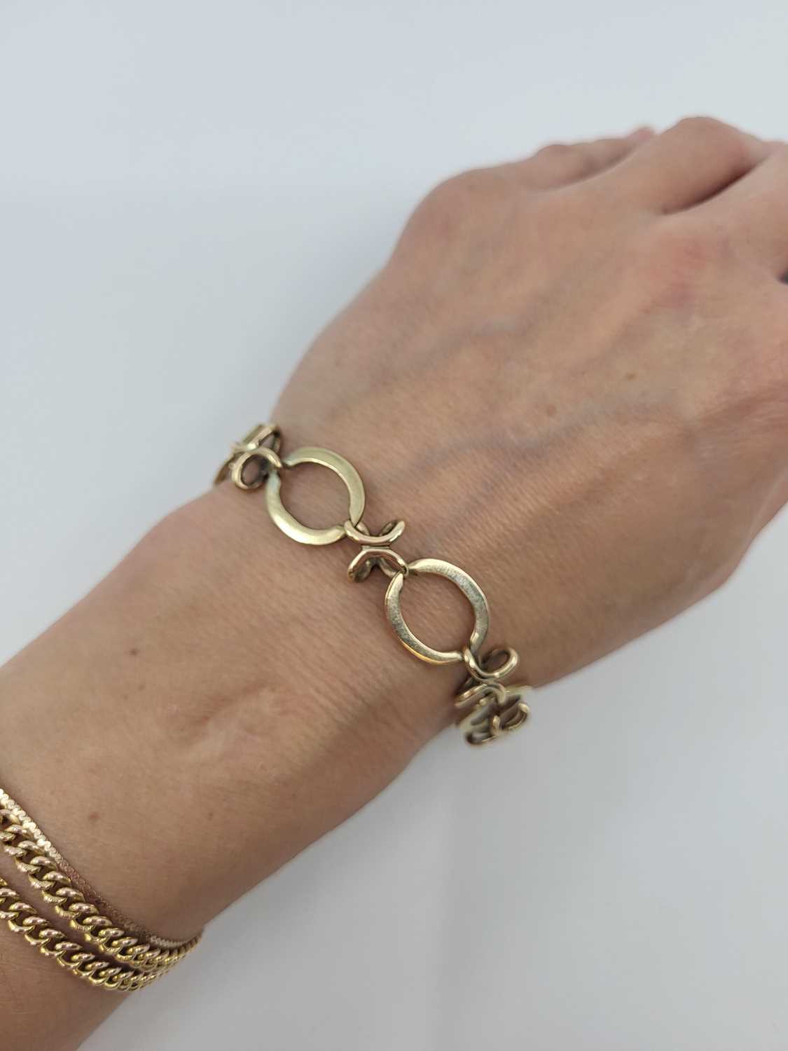 Lot 66 - A 9CT YELLOW GOLD OPEN FANCY LINK BRACELET, 19....