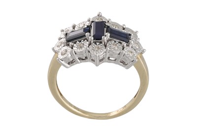 Lot 25 - A DIAMOND AND SAPPHIRE CLUSTER RING, mounted...