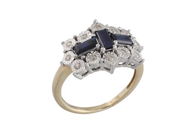 Lot 25 - A DIAMOND AND SAPPHIRE CLUSTER RING, mounted...