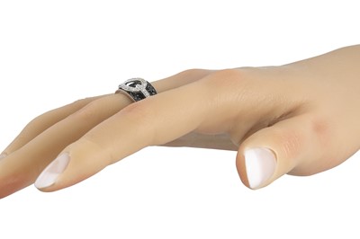 Lot 25 - A DIAMOND AND SAPPHIRE CLUSTER RING, mounted...