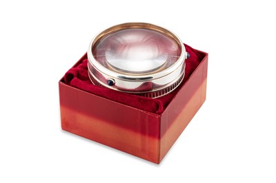 Lot 263 - A CARTIER MAGNIFYING PAPER WEIGHT, signed...