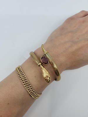 Lot 30 - AN EARLY 20TH CENTURY SNAKE BRACELET, flexible...