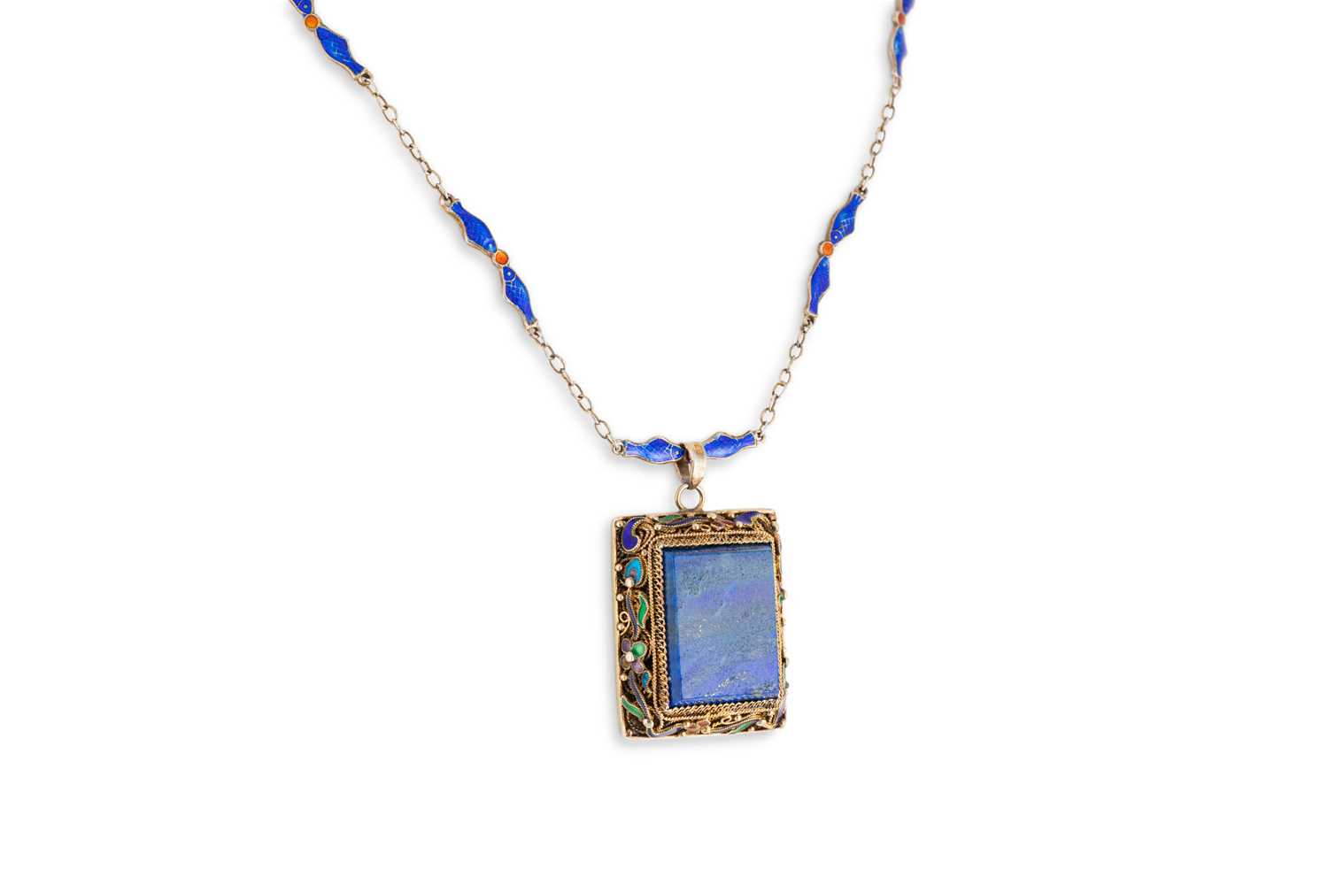 Lot 32 - A CONTINENTAL ART DECO LAPIZ LAZULI AND ENAMEL...