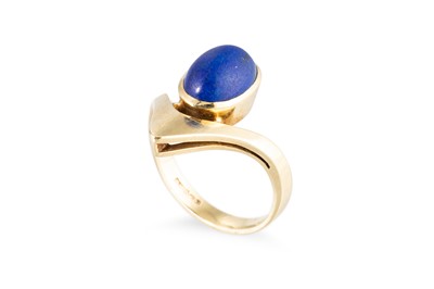 Lot 72 - A 1970S DESIGNER RING, set with lapis lazuli,...