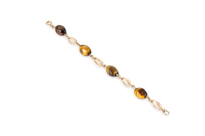 Lot 7 - A 9CT GOLD AND TIGER'S EYE SET BRACELET, the...
