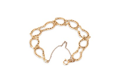 Lot 9 - A 9CT GOLD BRACELET OF HORSESHOE MOTIF LINKS,...