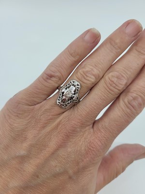 Lot 117 - A VINTAGE DIAMOND SET NAVETTE STYLE RING, of...