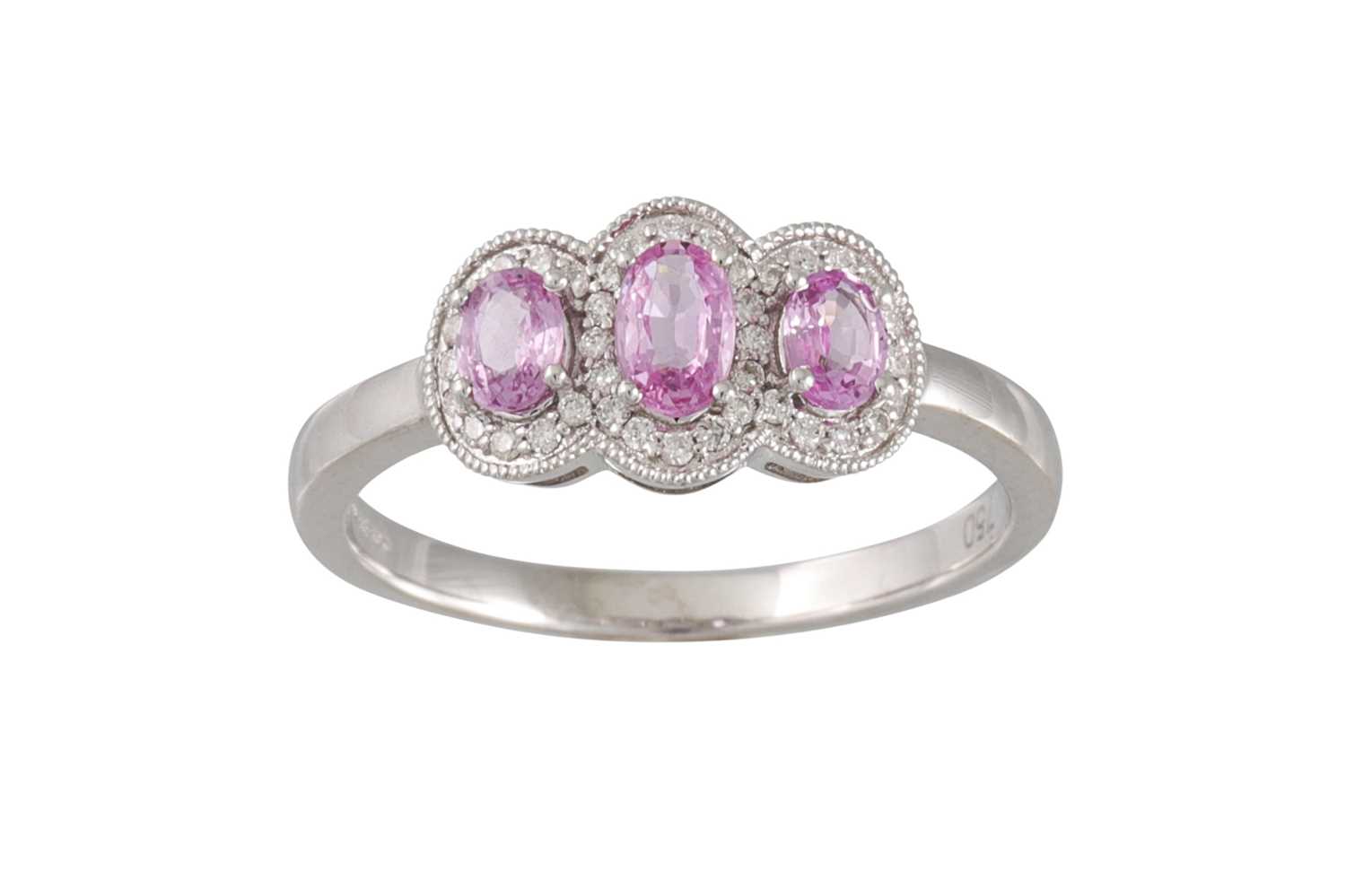 Lot 47 - A DIAMOND AND PINK SAPPHIRE DRESS RING,...