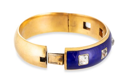 Lot 25 - A VICTORIAN ENAMEL AND PASTE BANGLE, the royal...