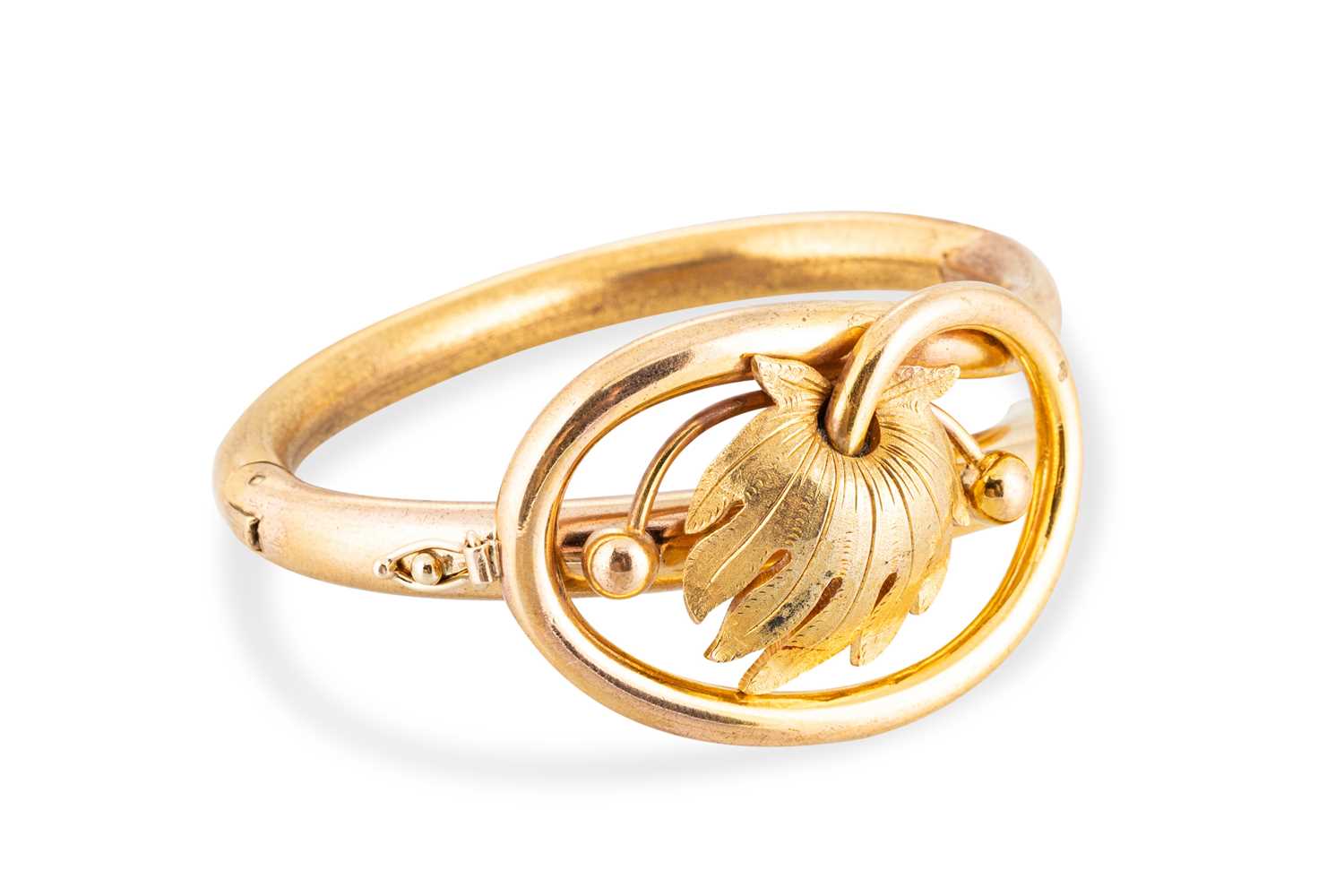 Lot 41 - A VICTORIAN GOLD PLATED SHAPED BANGLE, of...