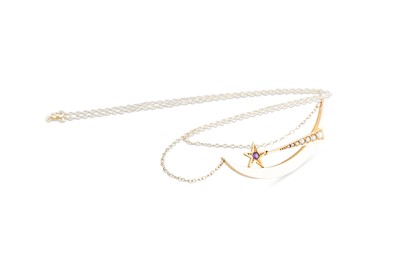 Lot 42 - AN EARLY 20TH CENTURY 'COMET' PENDANT, in 9ct...