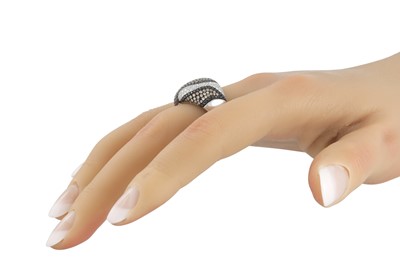 Lot 51 - A THREE COLOURED DIAMOND BOMBÉ SHAPED RING,...
