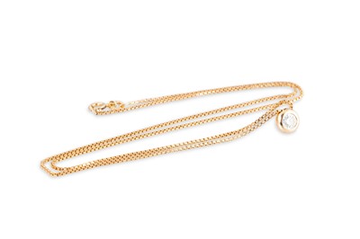 Lot 68 - A DIAMOND PENDANT, the round brilliant cut...