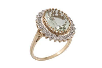Lot 53 - A DIAMOND AND GREEN QUARTZ DRESS RING, the...