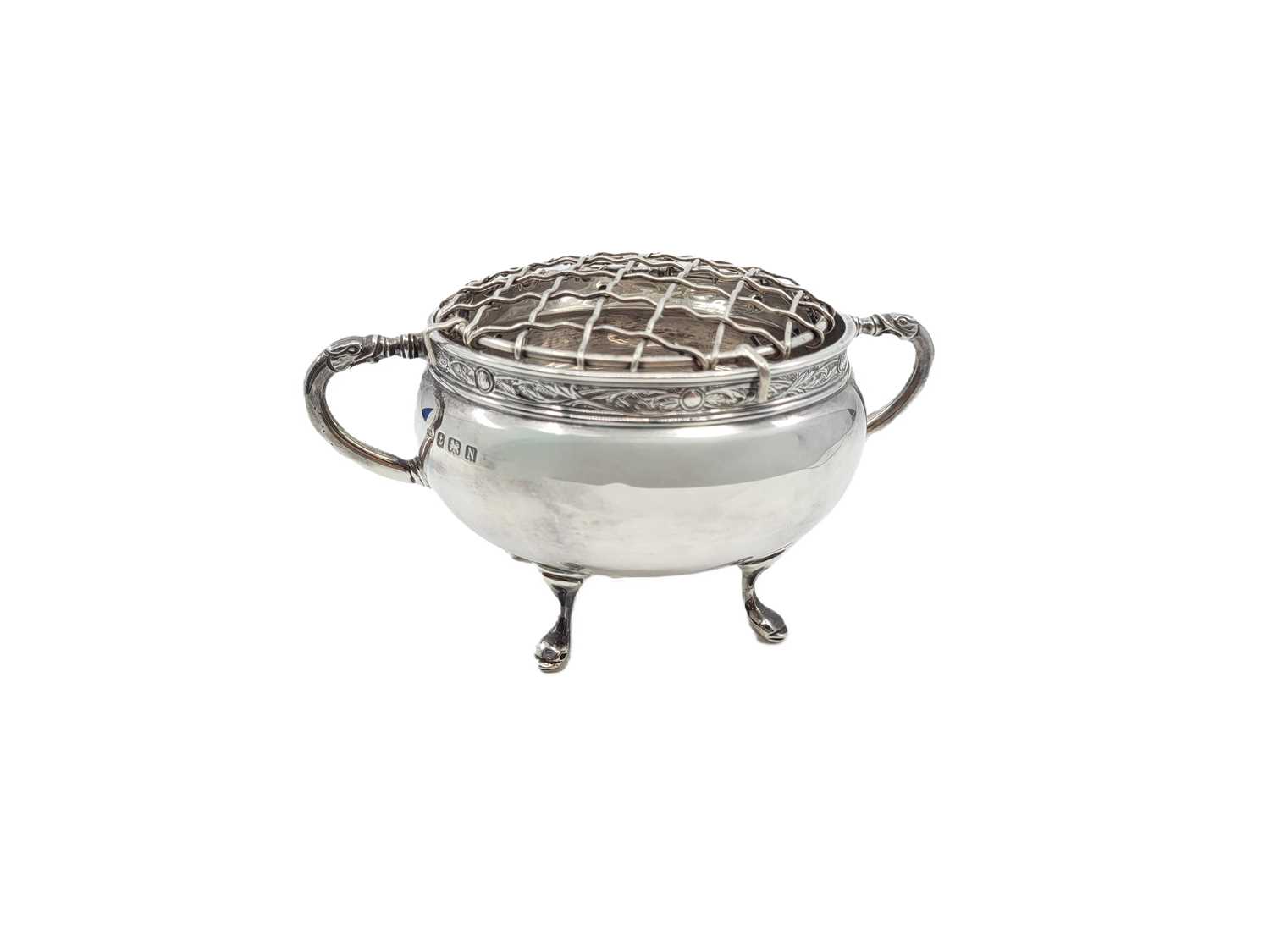 Lot 541 - A SMALL TWIN-HANDLED SILVER BOWL, with flower...
