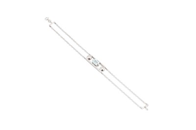 Lot 90 - A DIAMOND AND AQUAMARINE BRACELET, the central...