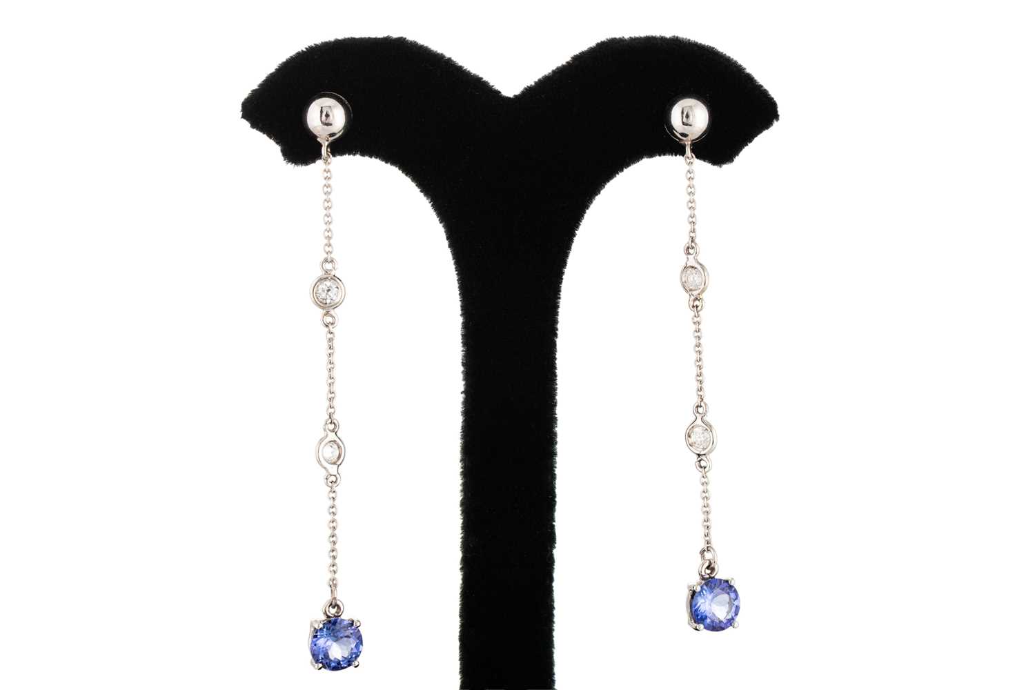 Lot 93 - A PAIR OF TANZANITE AND DIAMOND DROP EARRINGS,...