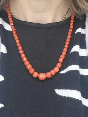 Lot 95 - A MEDITERRANEAN CORAL BEADED NECKLACE, the...
