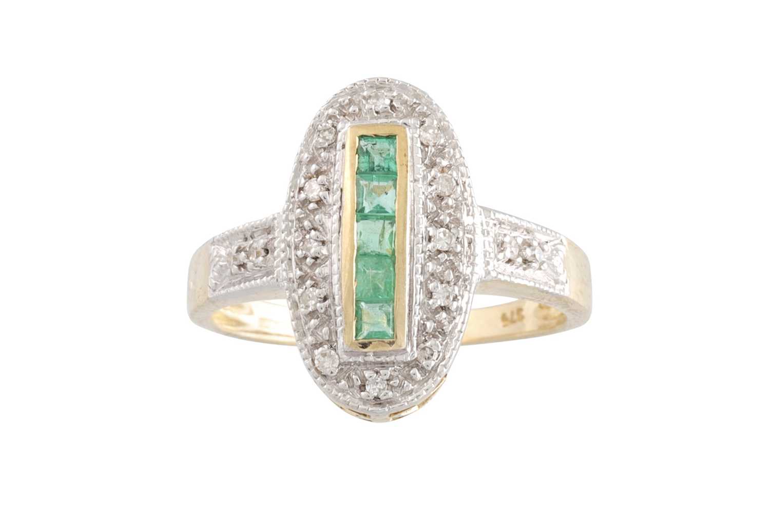 Lot 63 - A DIAMOND AND EMERALD OVAL SHAPED RING, the...