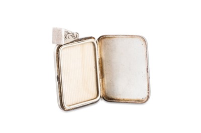 Lot 65 - A LATE 19TH CENTURY RECTANGULAR SILVER LOCKET,...